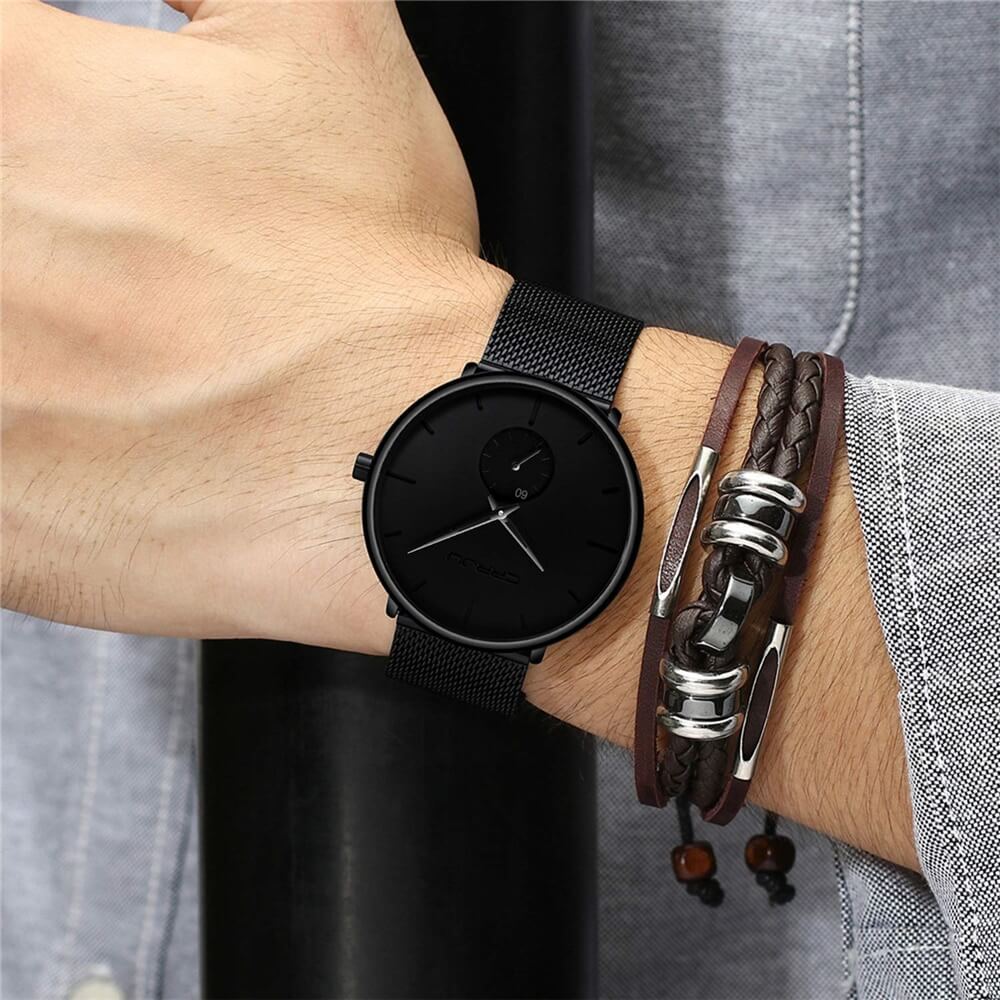 Montre analogique en acier inoxydable noire - Design moderne et minimaliste.