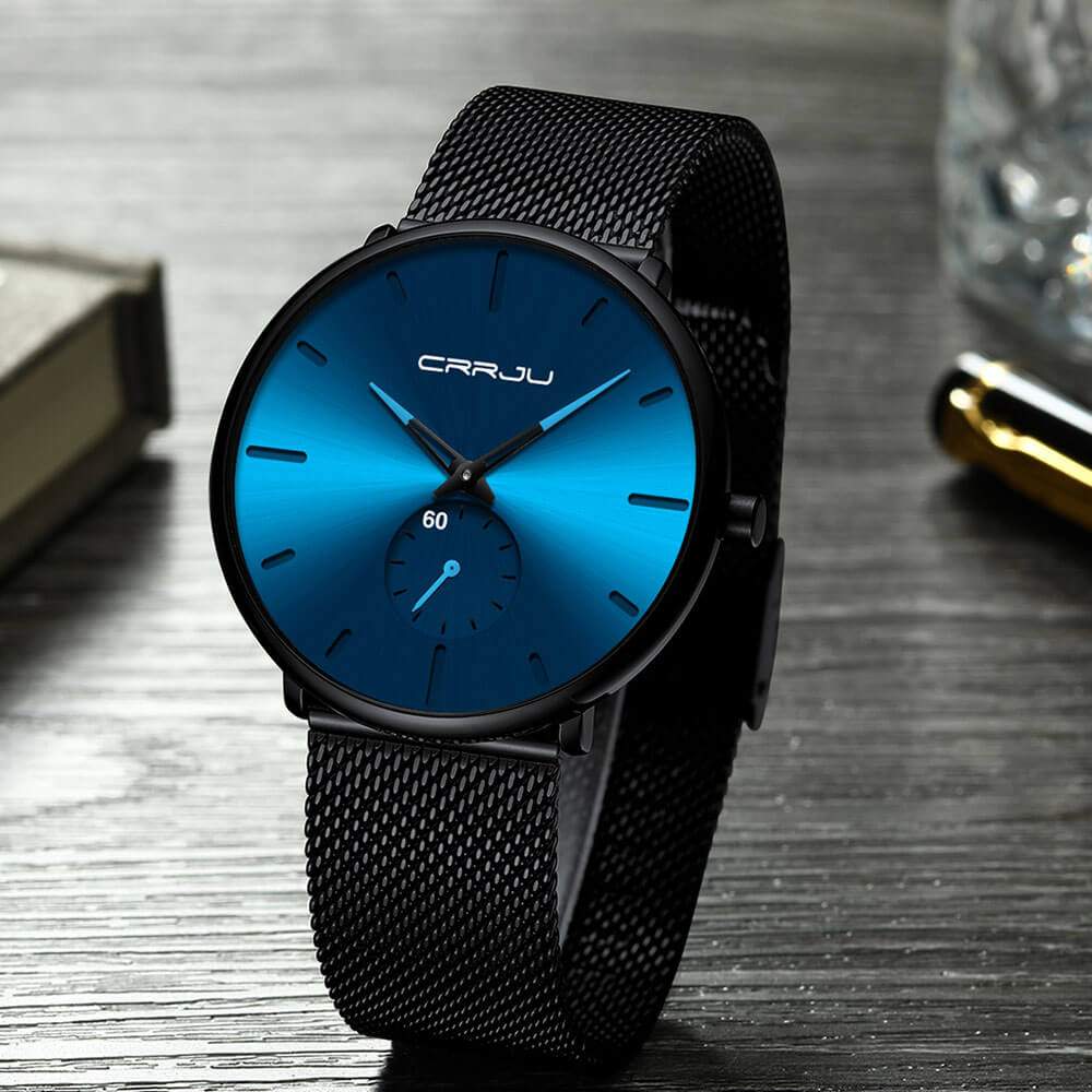 Montre analogique en acier inoxydable noire - Design moderne et minimaliste.