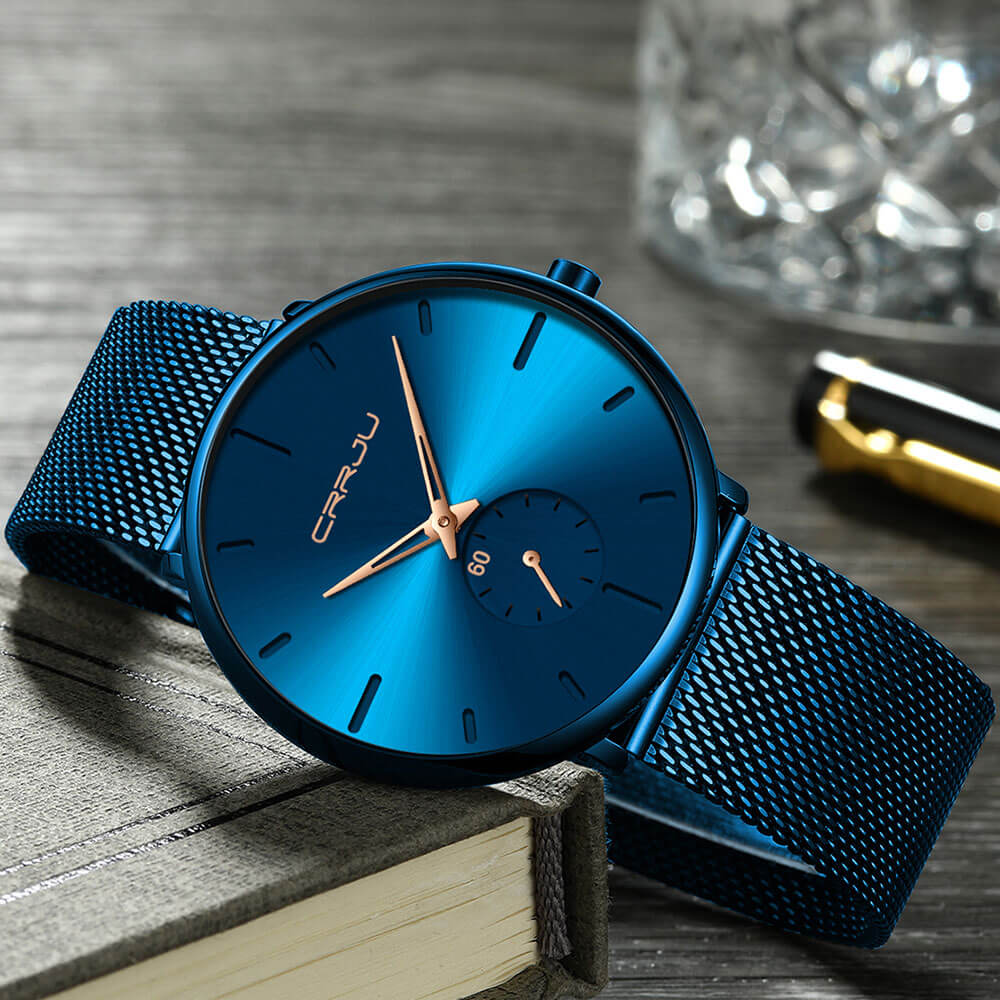 Montre analogique en acier inoxydable noire - Design moderne et minimaliste.
