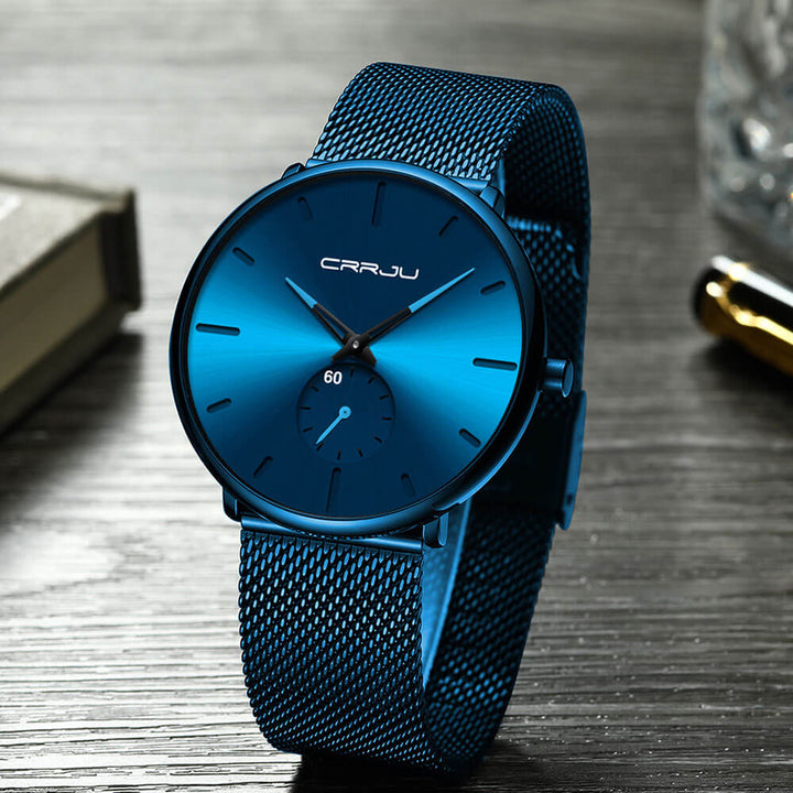 Montre analogique en acier inoxydable noire - Design moderne et minimaliste.