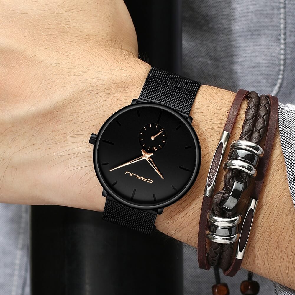 Montre analogique en acier inoxydable noire - Design moderne et minimaliste.