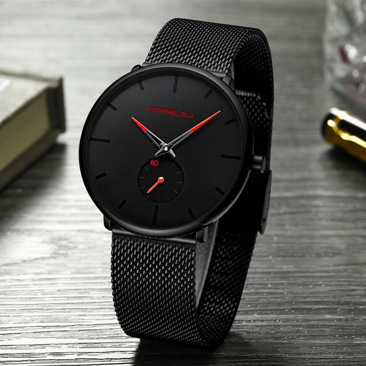 Montre analogique en acier inoxydable noire - Design moderne et minimaliste.