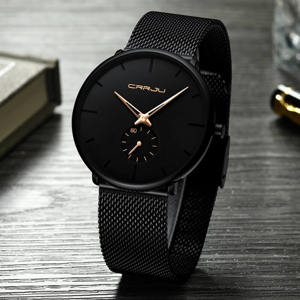 Montre analogique en acier inoxydable noire - Design moderne et minimaliste.