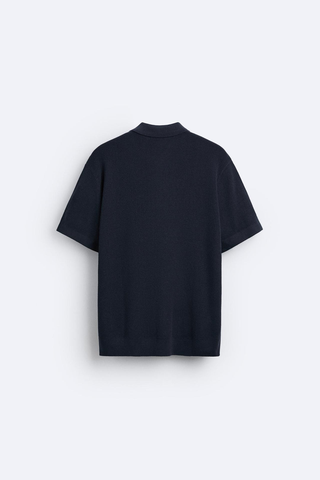 Polo tricotée élégante avec fermeture éclair pour un look raffiné