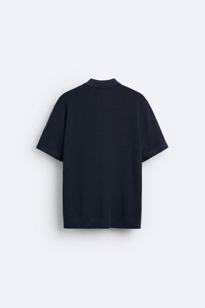 Polo tricotée élégante avec fermeture éclair pour un look raffiné