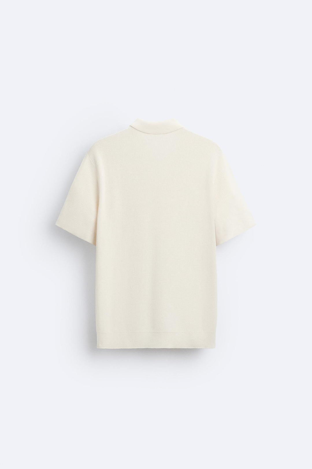 Polo tricotée élégante avec fermeture éclair pour un look raffiné