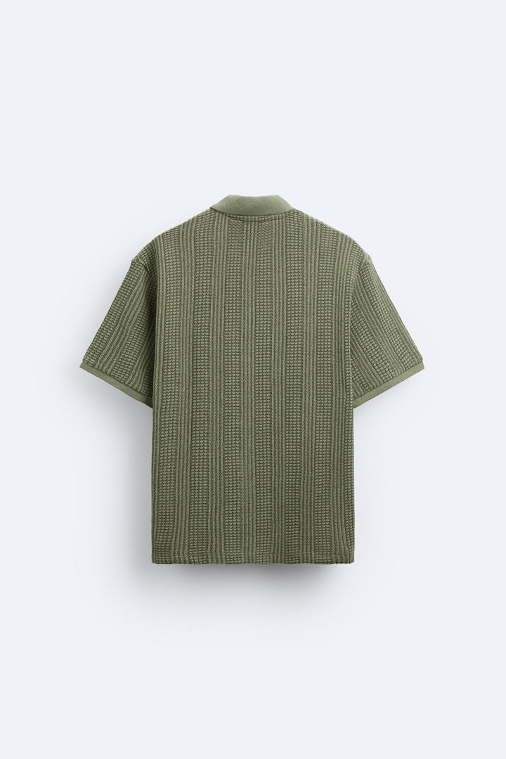 Polo tricotée élégante avec fermeture éclair pour un look chic