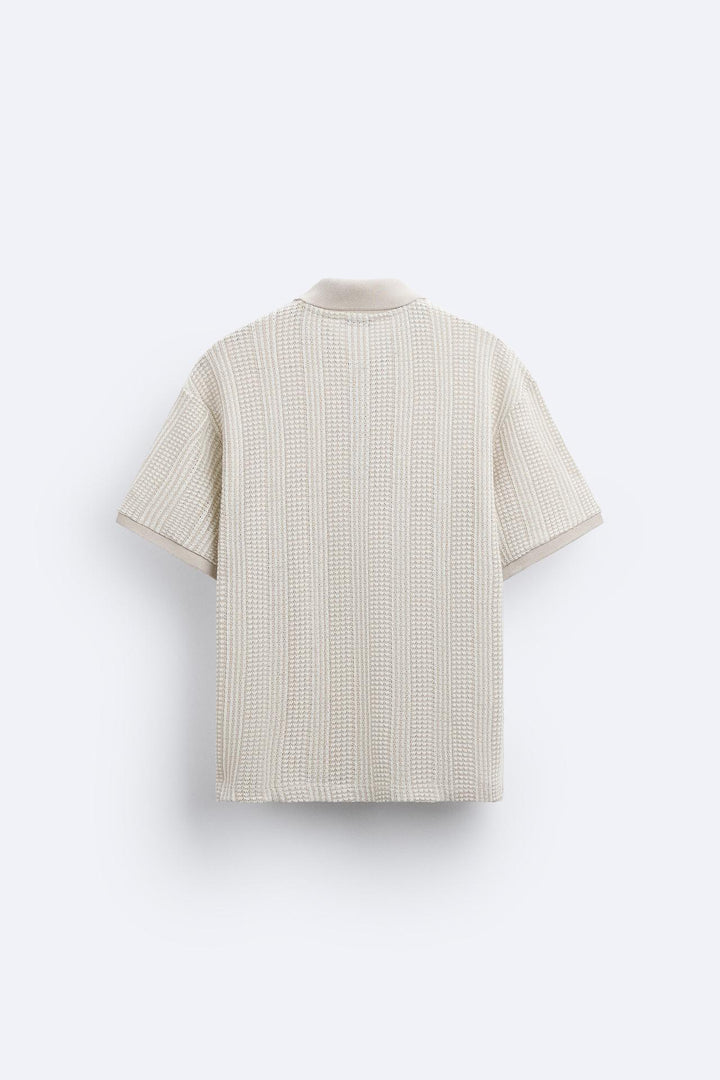 Polo tricotée élégante avec fermeture éclair pour un look chic
