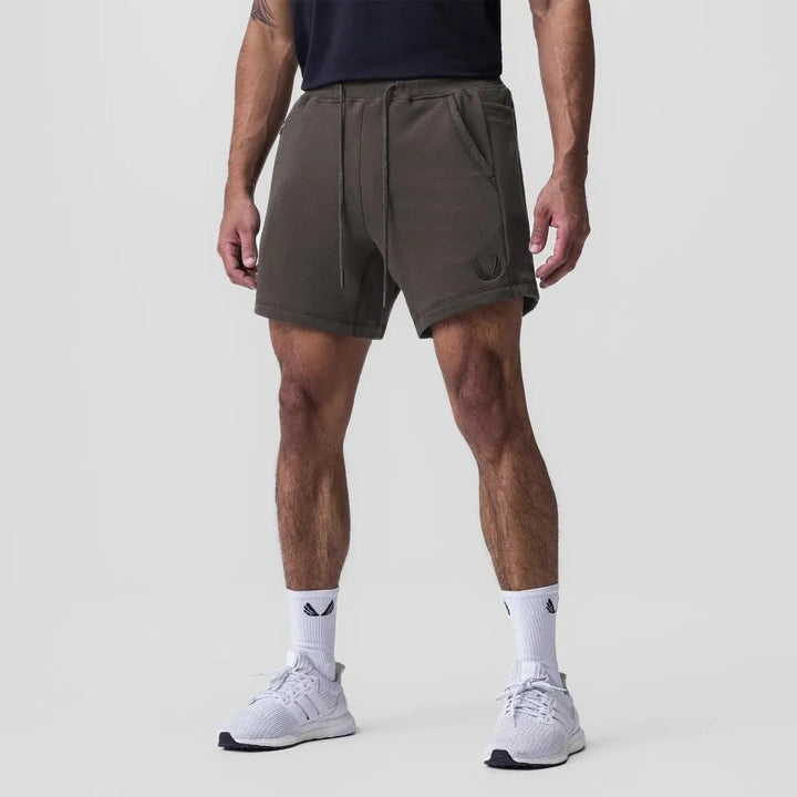 Shorts Athlétiques pour Hommes - Tissu Respirable, Waist Élastique, Poches Latérales - Parfait pour le Sport et les Jours Décontractés
