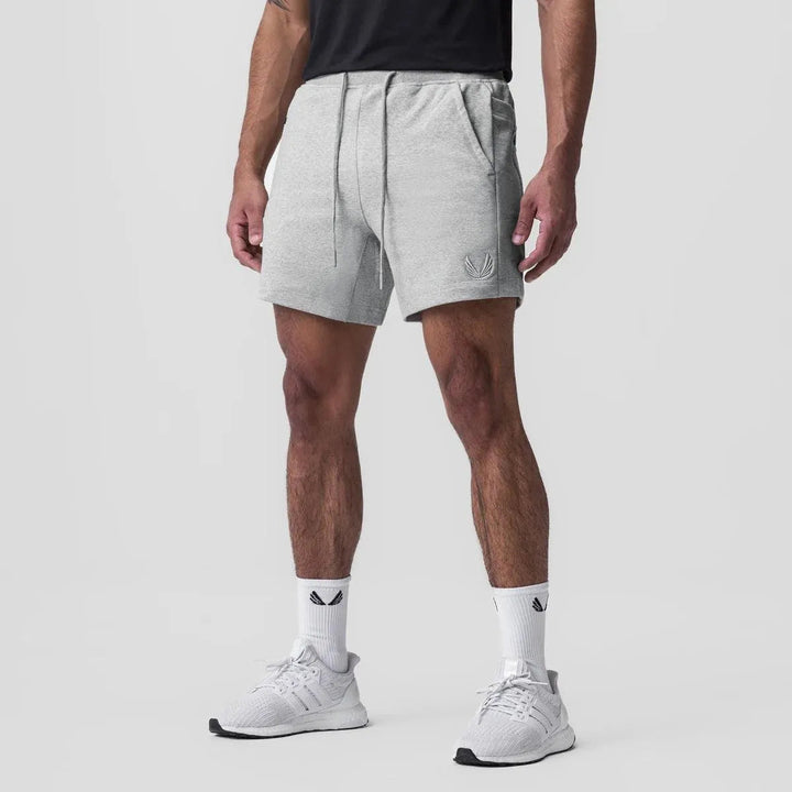 Shorts Athlétiques pour Hommes - Tissu Respirable, Waist Élastique, Poches Latérales - Parfait pour le Sport et les Jours Décontractés