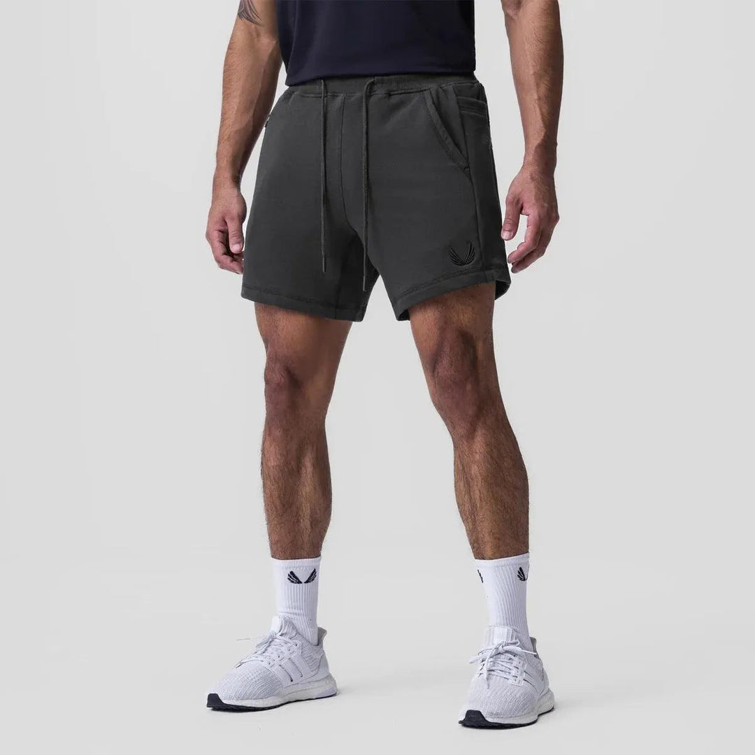 Shorts Athlétiques pour Hommes - Tissu Respirable, Waist Élastique, Poches Latérales - Parfait pour le Sport et les Jours Décontractés