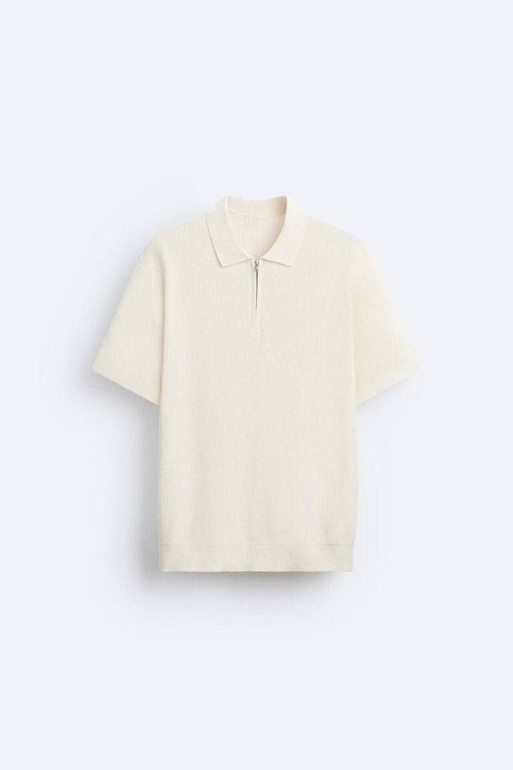 Polo tricotée élégante avec fermeture éclair pour un look raffiné