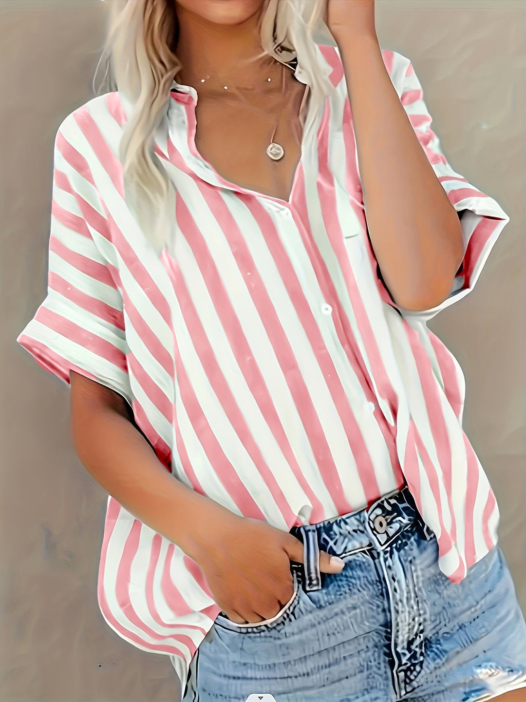 Chemise rayée stylée Gretel avec fermeture à boutons et manches courtes pour un look tendance.