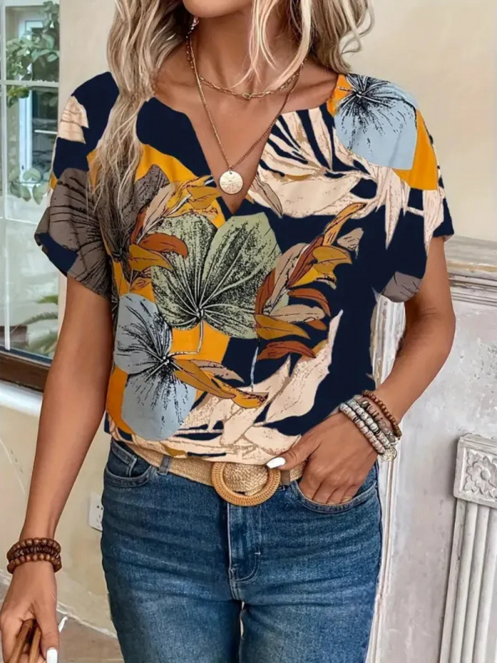 Chemisier pour femmes Lucrezia avec motif floral élégant à manches courtes - Le haut parfait pour toute occasion.
