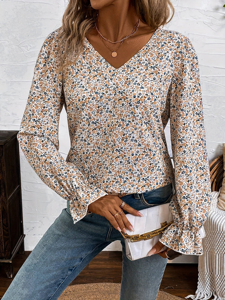 Eglantine | Blouse à imprimé floral chic avec décolleté en V et détail de nœud en dentelle, élégant design à dos bas.