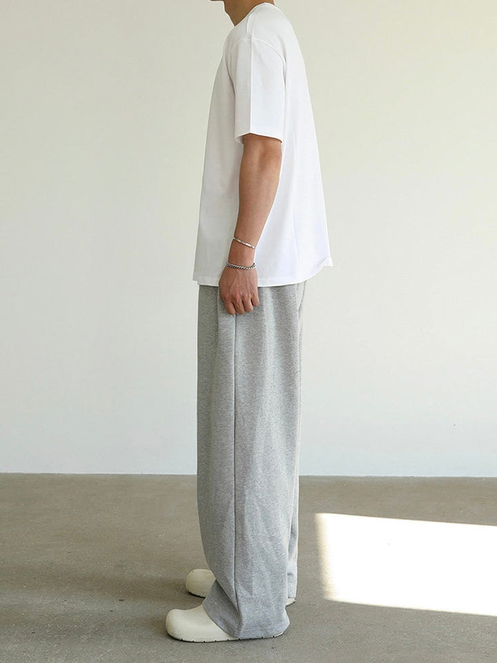 Pantalon de jogging large confortable et élégant pour des journées décontractées.