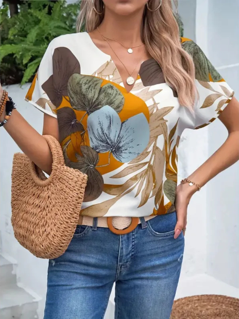 Chemisier pour femmes Lucrezia avec motif floral élégant à manches courtes - Le haut parfait pour toute occasion.
