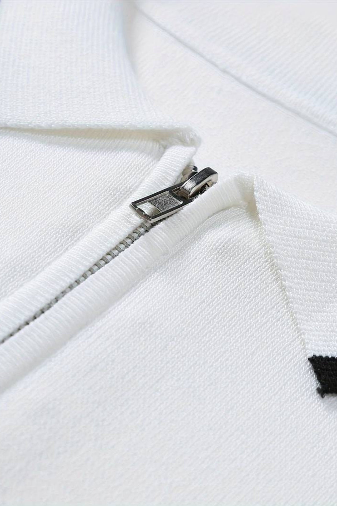 Polo classique élégante avec fermeture éclair et détails contrastés élégants