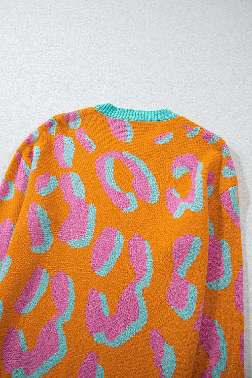 Elouise - Pull orange léopard tendance pour un look remarquable