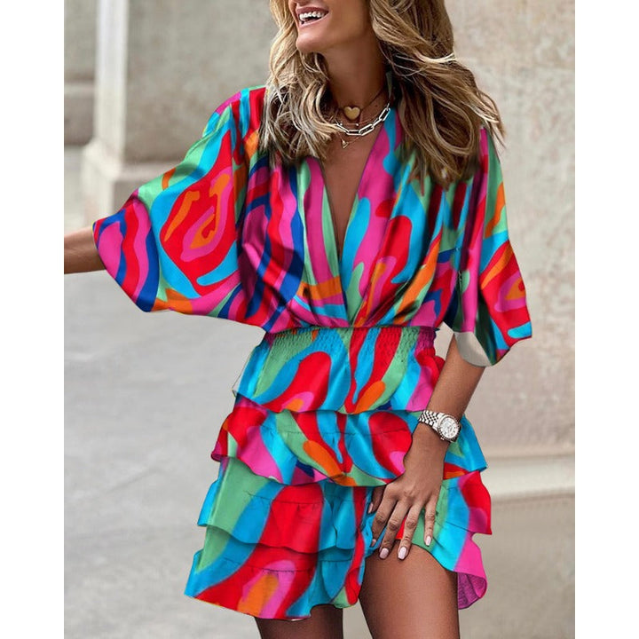Louisa | Robe mini charmante avec décolleté en V et overlay en volants - le style d'été parfait