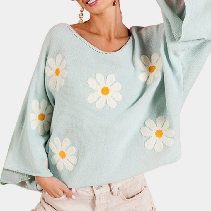 Blouse Astrid élégante avec un imprimé floral enchanteur pour un look stylé.