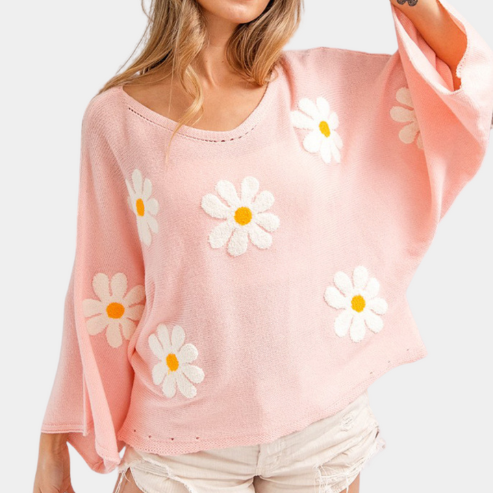 Blouse Astrid élégante avec un imprimé floral enchanteur pour un look stylé.