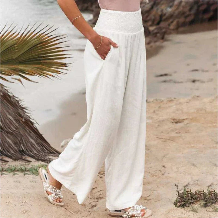 Pantalon d'été léger et confortable avec taille froncé pour un look décontracté.
