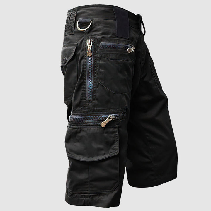 Short pour homme avec une longueur au genou, poches multifonctionnelles et un mélange de coton durable pour un confort de port ultime.