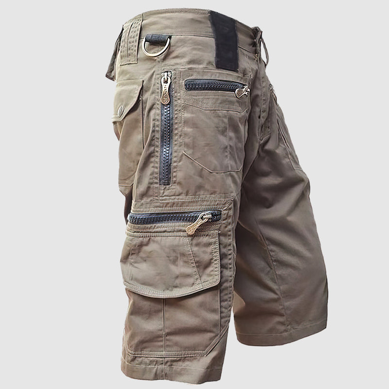 Short pour homme avec une longueur au genou, poches multifonctionnelles et un mélange de coton durable pour un confort de port ultime.