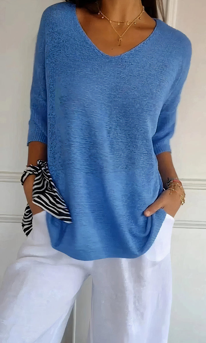 Top élégante Elsa avec un col en V pour un look parfait.