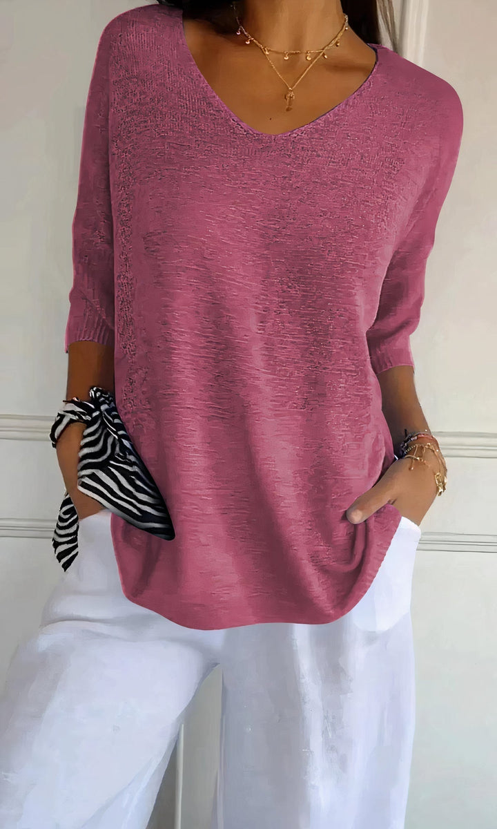 Top élégante Elsa avec un col en V pour un look parfait.