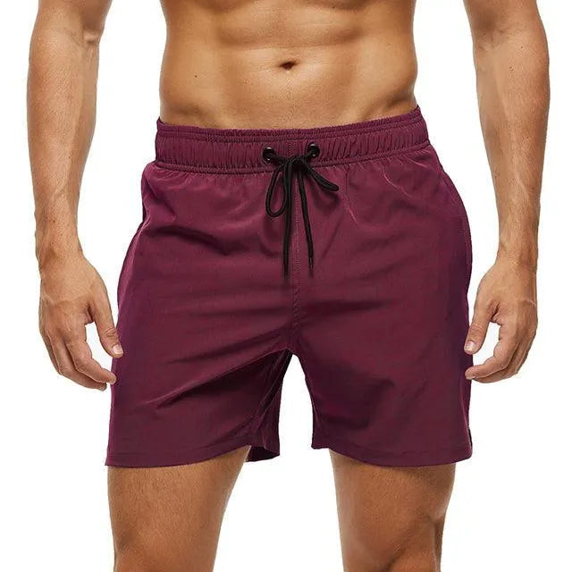 Shorts décontractés pour hommes avec taille élastique et tissu léger et respirant.