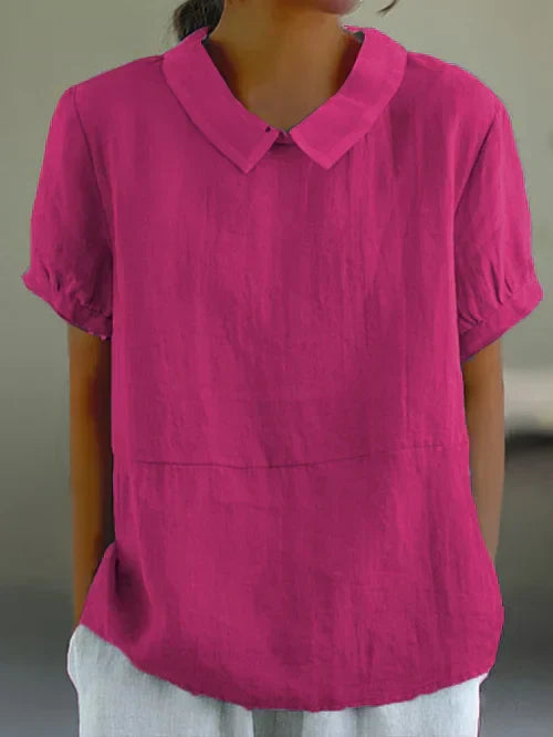 Blouse pour dames Marie élégante avec un col rond chic et des manches courtes confortables.