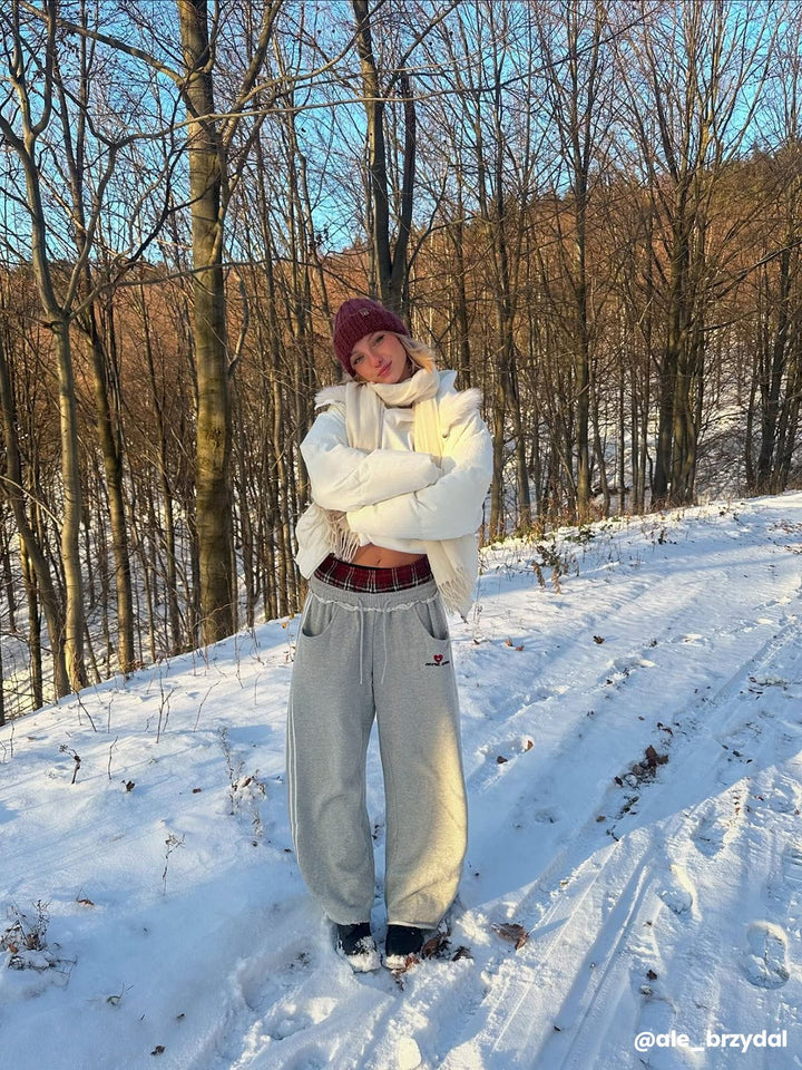 Jazzlyn - Pantalon de jogging grise chic avec une luxueuse ceinture double pour confort et style.