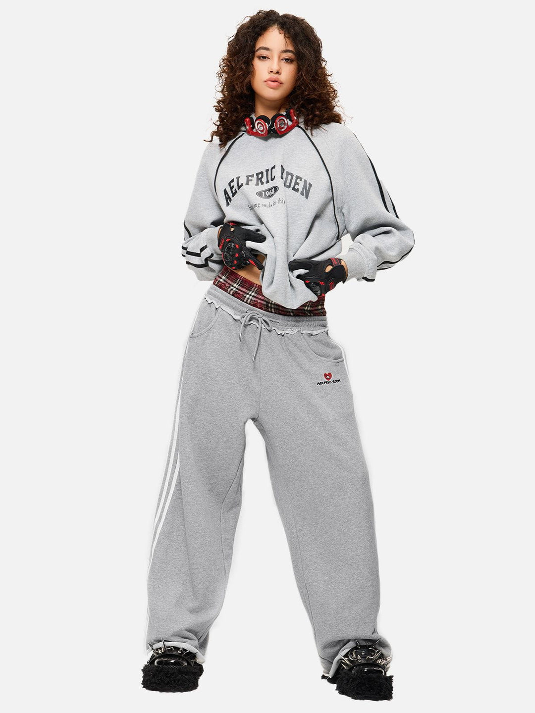 Jazzlyn - Pantalon de jogging grise chic avec une luxueuse ceinture double pour confort et style.