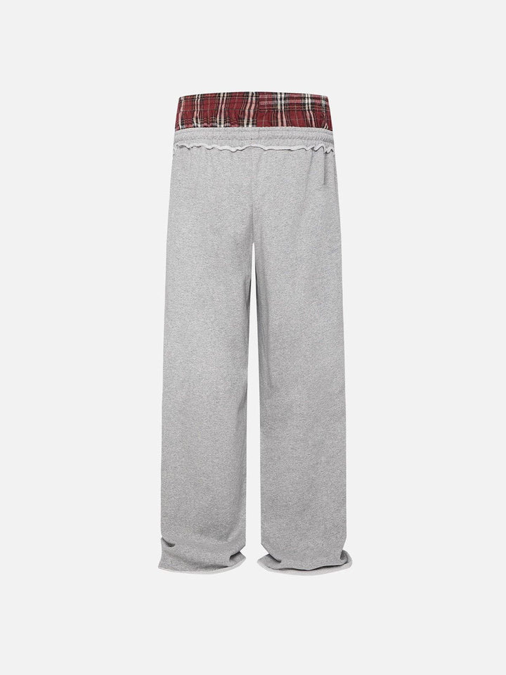 Jazzlyn - Pantalon de jogging grise chic avec une luxueuse ceinture double pour confort et style.