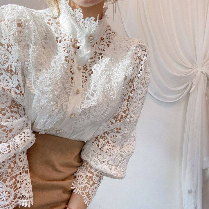 Zahirah - Blouse élégante pour femmes avec manches bouffantes et un col haut raffiné pour un look chic.