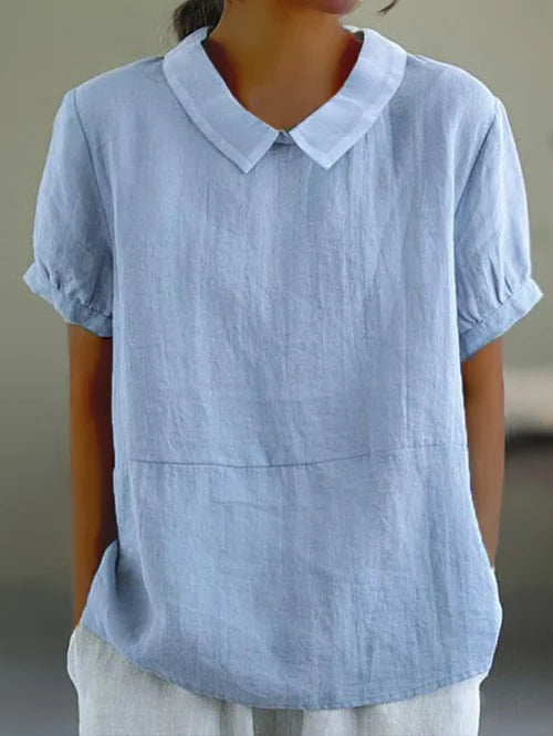 Blouse pour dames Marie élégante avec un col rond chic et des manches courtes confortables.