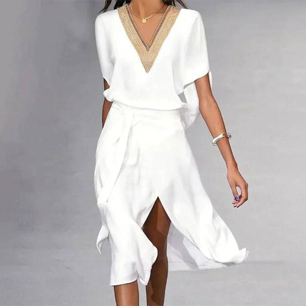Katra | Élégante robe de chambre midi blanche avec décolleté en V - parfaite pour les occasions décontractées et en soirée, en matière très confortable à porter.