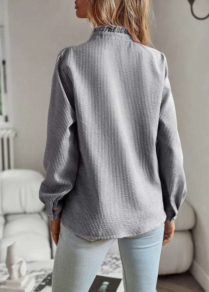 Blouse élégante pour femme à manches longues avec volants pour un look chic | Mecca
