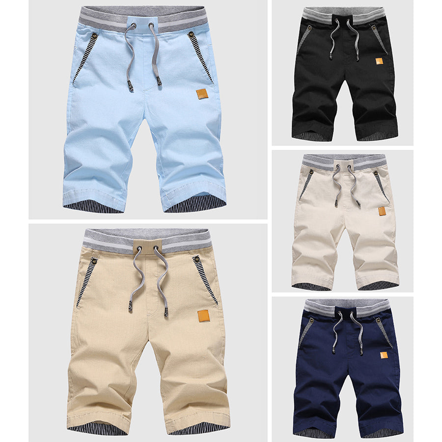 Shorts décontractés élégants pour hommes avec taille à cordon, poches zippées pratiques et coupe confortable arrivant au genou.