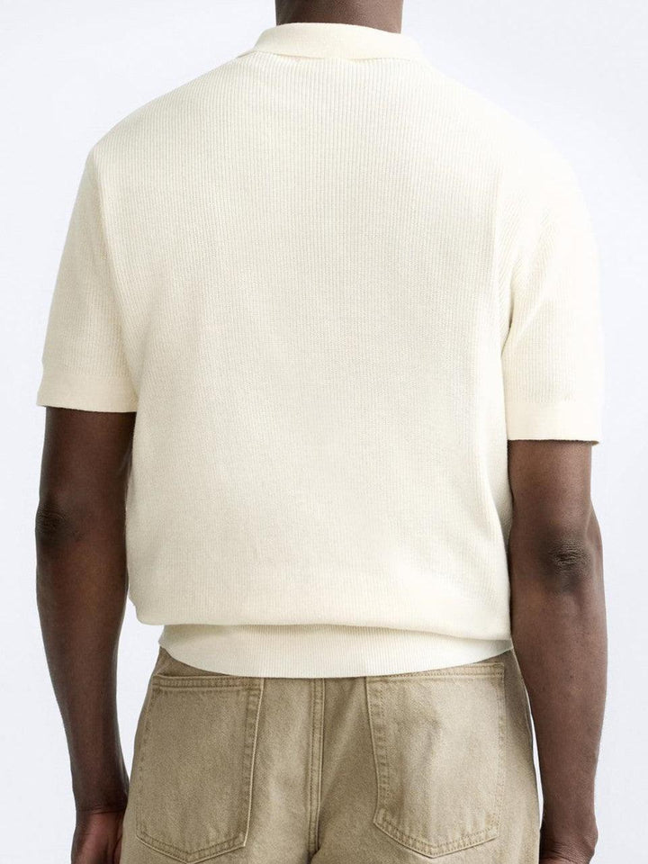 Polo tricotée élégante avec fermeture éclair pour un look raffiné