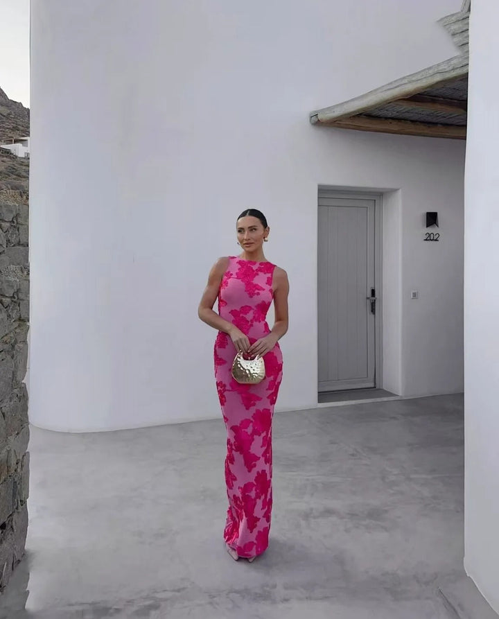 Nabila Élégante robe de chambre sans manches avec imprimé floral pour un look d'été chic et stylé.
