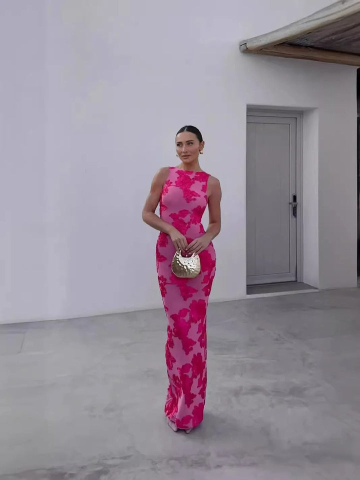 Nabila Élégante robe de chambre sans manches avec imprimé floral pour un look d'été chic et stylé.