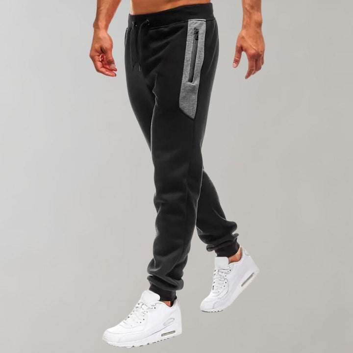 Misha - Pantalon de jogging confortable avec des poches zippées pratiques