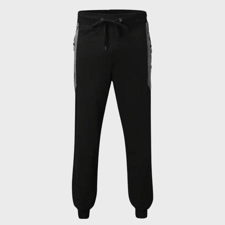 Misha - Pantalon de jogging confortable avec des poches zippées pratiques
