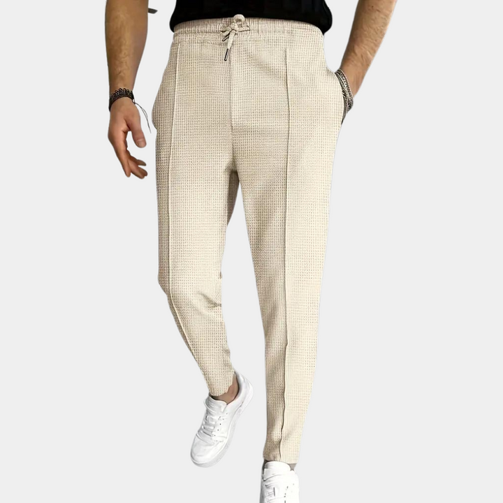 Pantalon de survêtement pour homme Mitchel avec cordon de serrage pour un confort optimal.