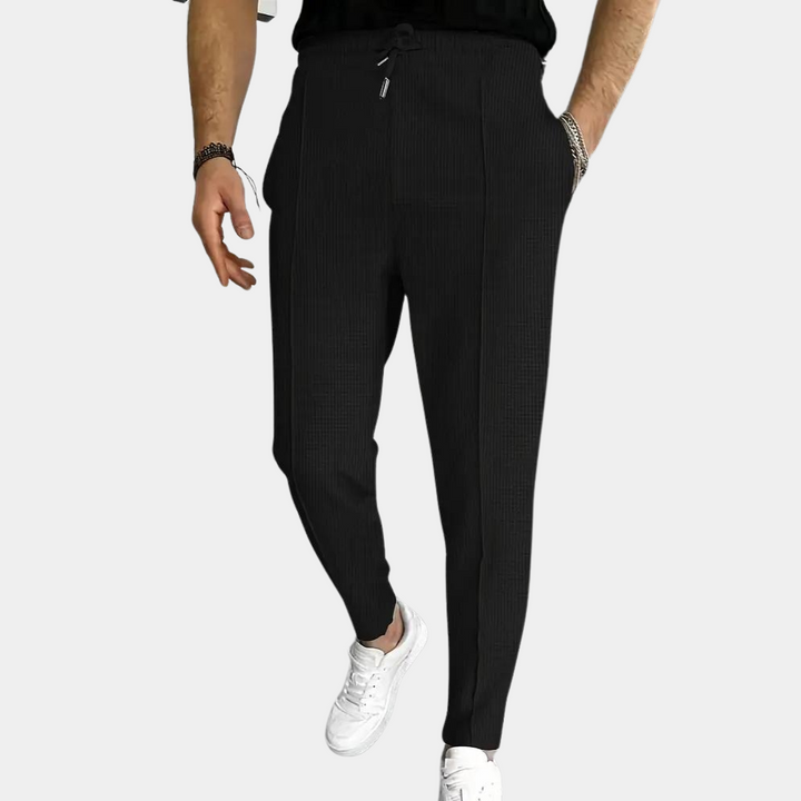 Pantalon de survêtement pour homme Mitchel avec cordon de serrage pour un confort optimal.