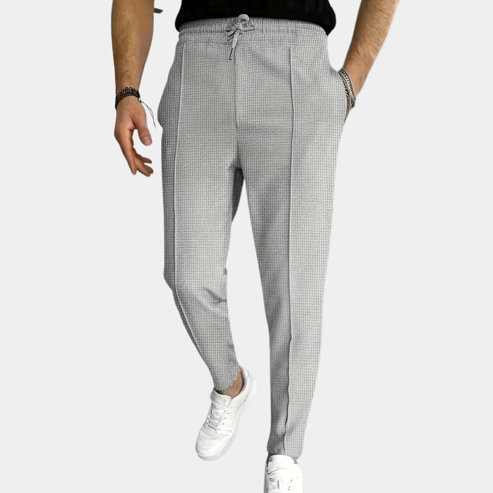 Pantalon de survêtement pour homme Mitchel avec cordon de serrage pour un confort optimal.