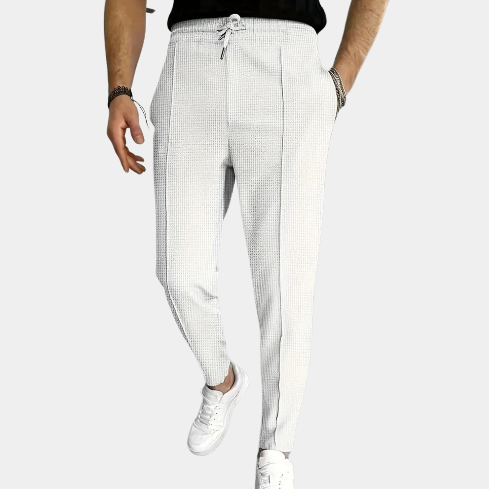 Pantalon de survêtement pour homme Mitchel avec cordon de serrage pour un confort optimal.